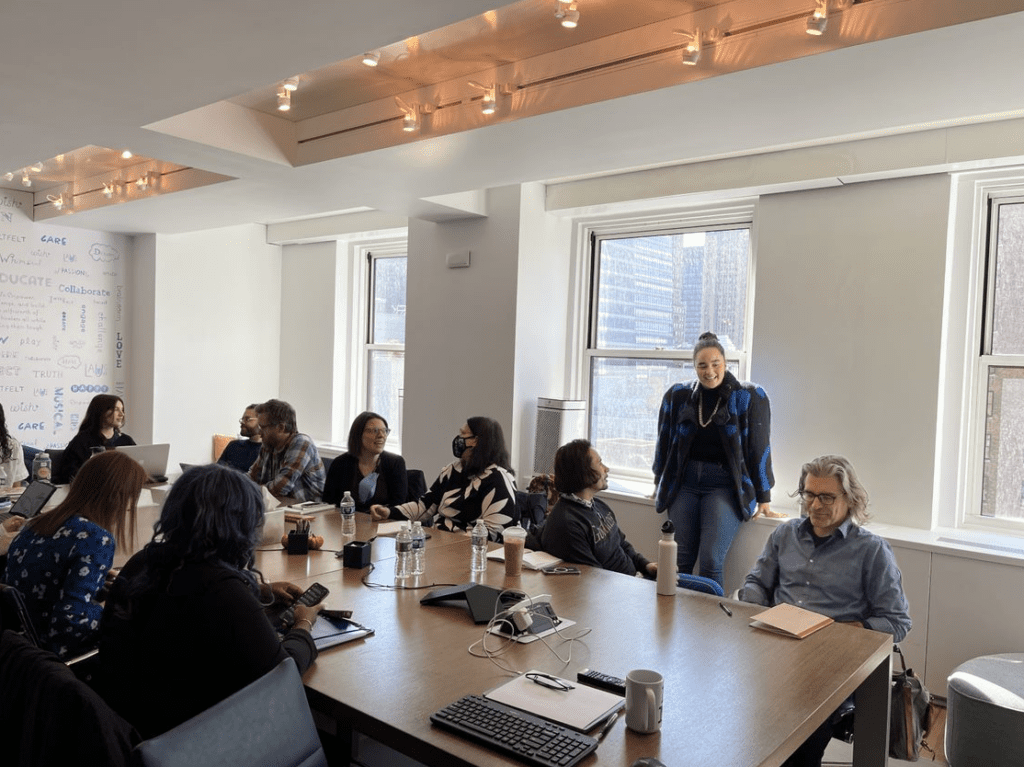 Halcyon Person presents to a group of RespectAbility Lab Fellows in 9 Story Media Groups' board room in New York City.